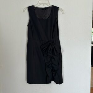 Black dress with bow detail purchased from boutique